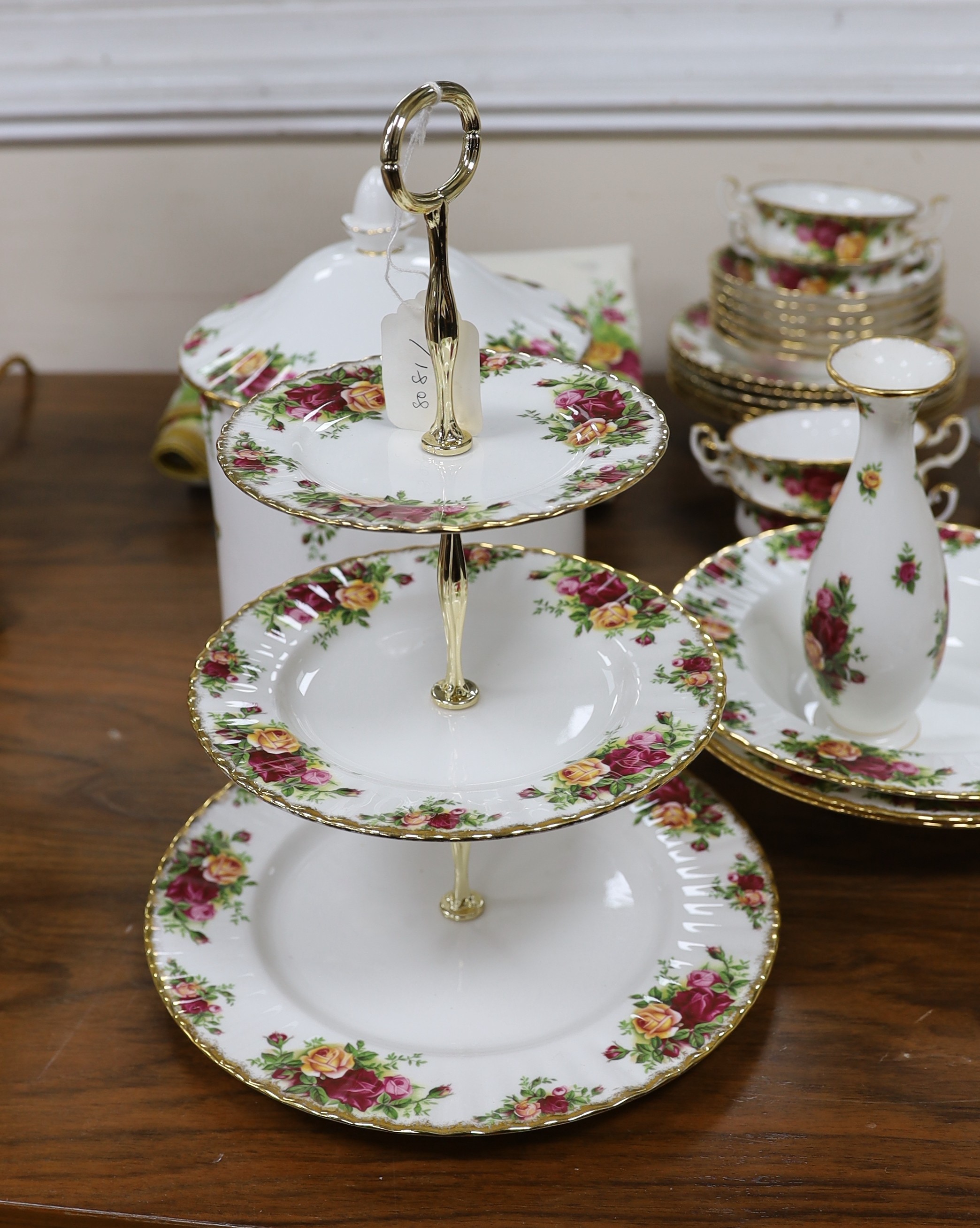 Royal Albert Old Country Rose dinner and tea service, to include a large biscuit box three tier cake stand etc